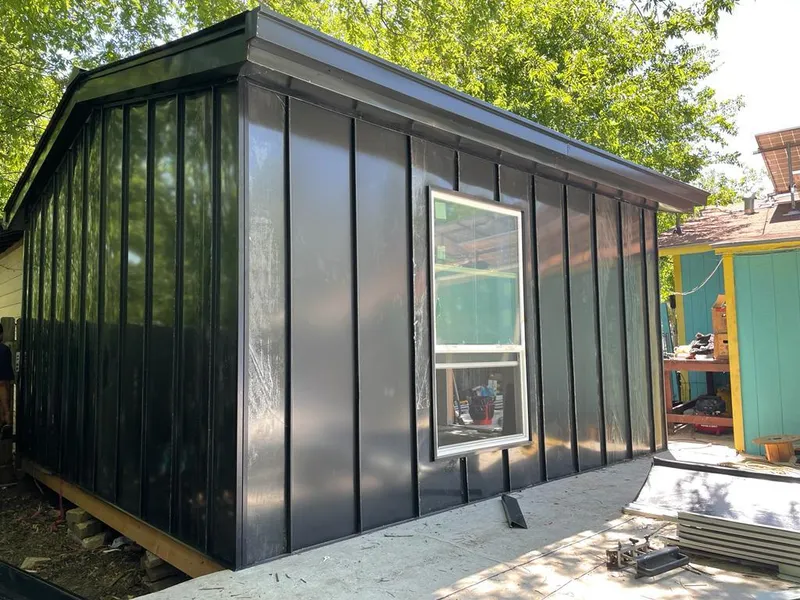 Black standing seam metal wall panels for Metal Roof Installation in Akron